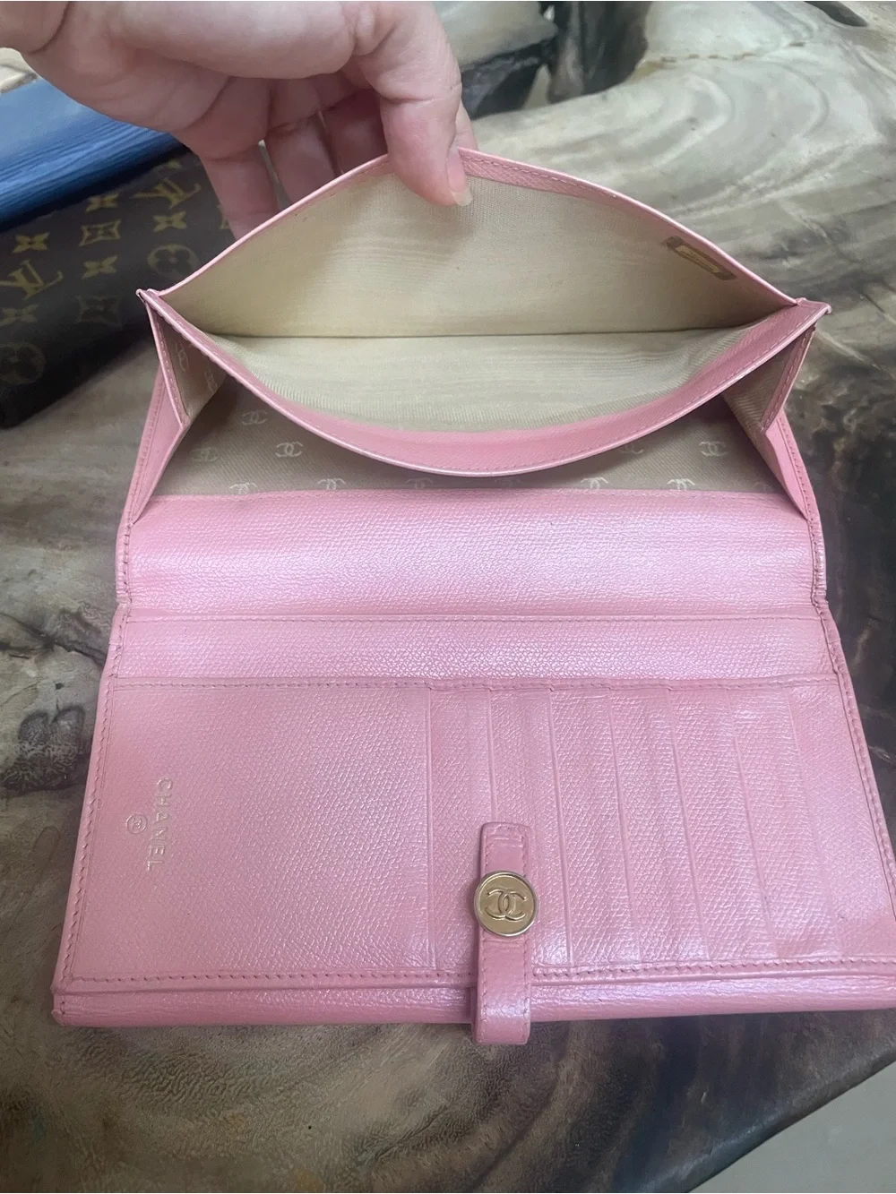Chanel continental iridescent pink gold long wallet.